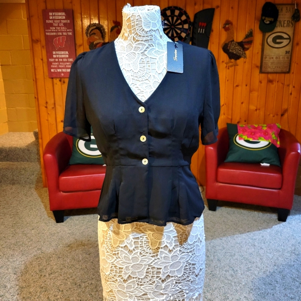 Shinestar blouse with buttons  and fitted at the waist.
